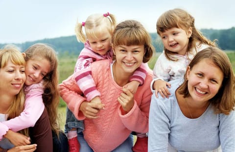 Part of the Mother's and More Team, with their Children